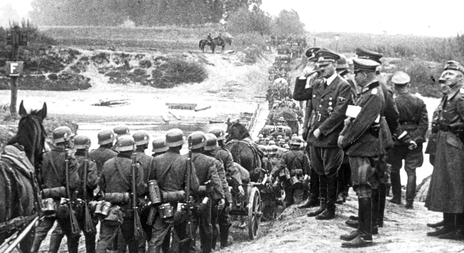 Adolf Hitler salutes his troops near Ubieszyn as they are crossing the Vistule river